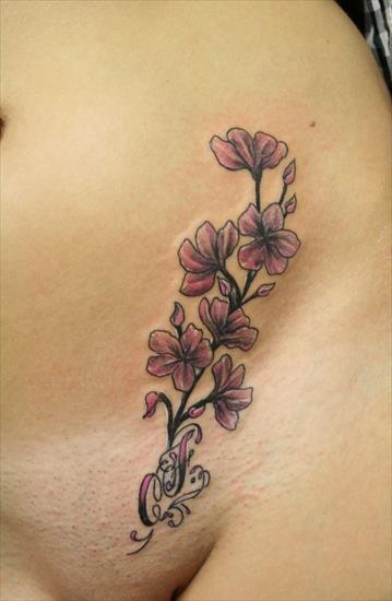 TATTOOS - Flower__chicano_letter_TaT_by_2Face_Tattoo.jpg