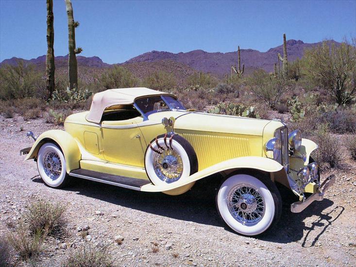 samochody - 1933 Auburn V-12 Boattail Speedster Yellow.jpg